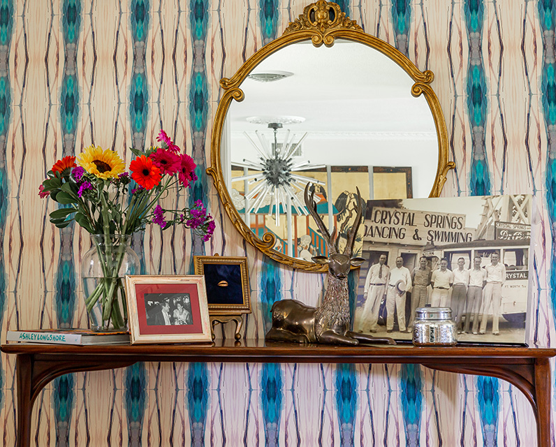 Table with flowers, mirror