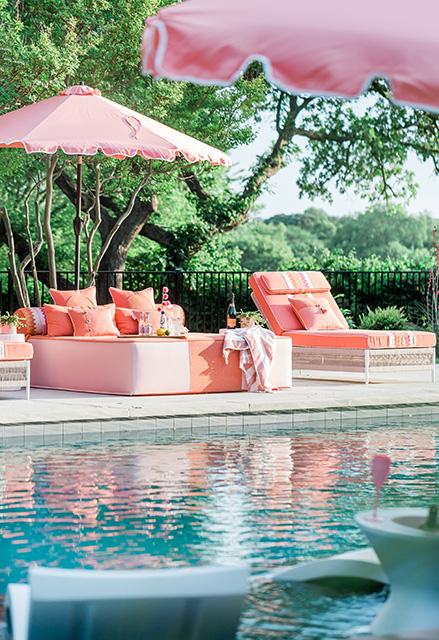 Pink lounge chairs by the pool