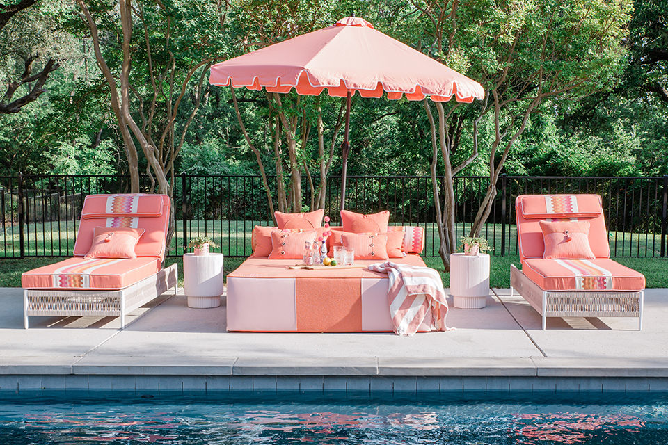 Pink loungers by Tarin Wallace's pool