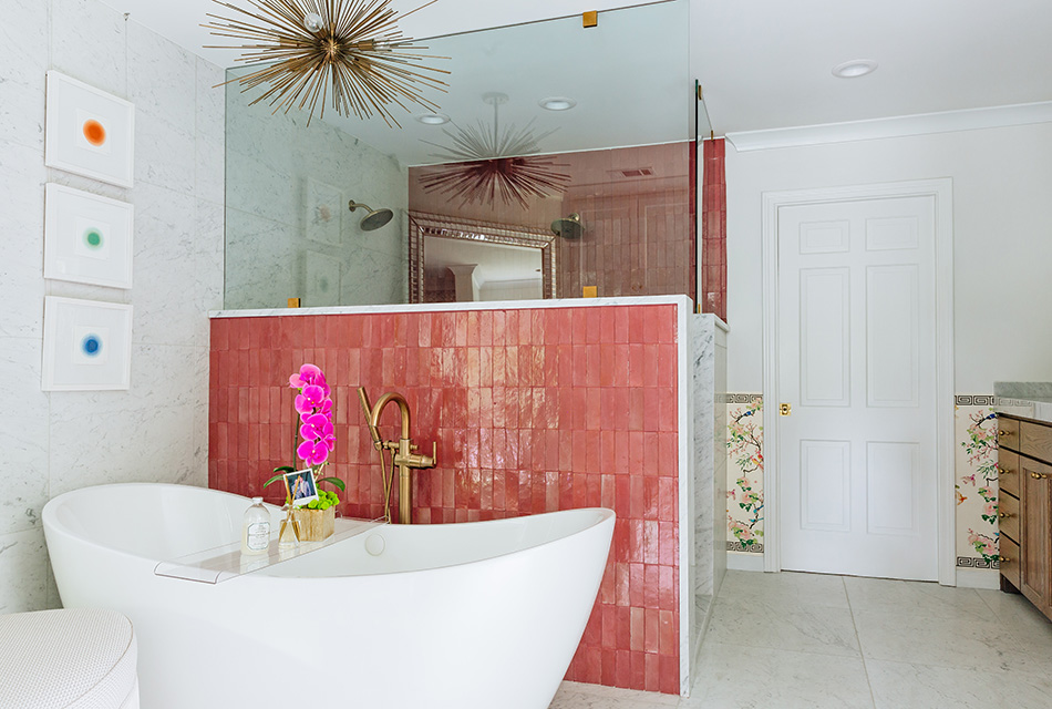 Wallace's bathroom features a deep pink tile wall