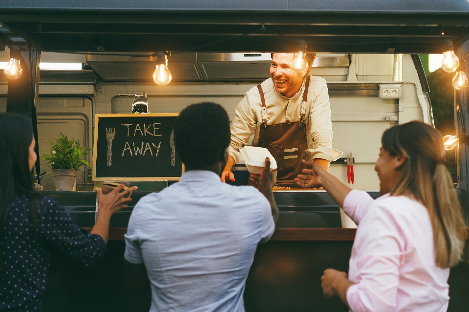 Guests being served at a food truck