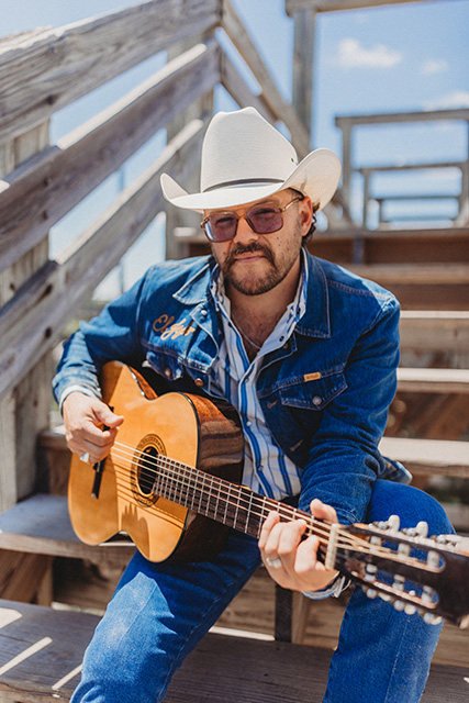 Josh Weathers with his guitar
