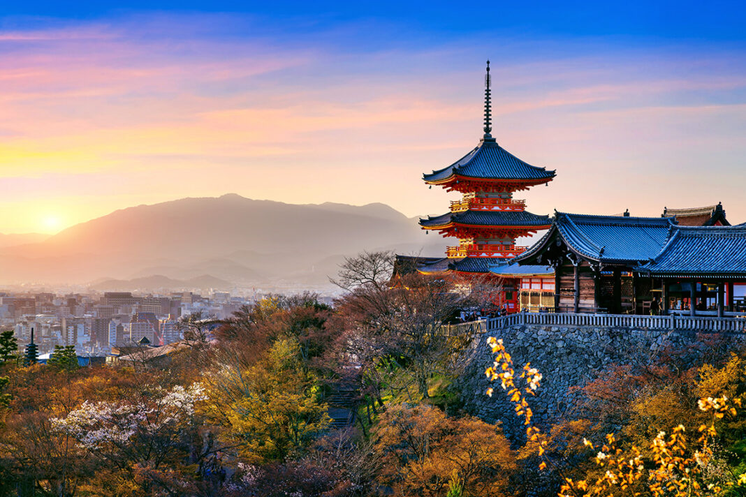 Kiyomizu temple at sunset in Kyoto, Japan.