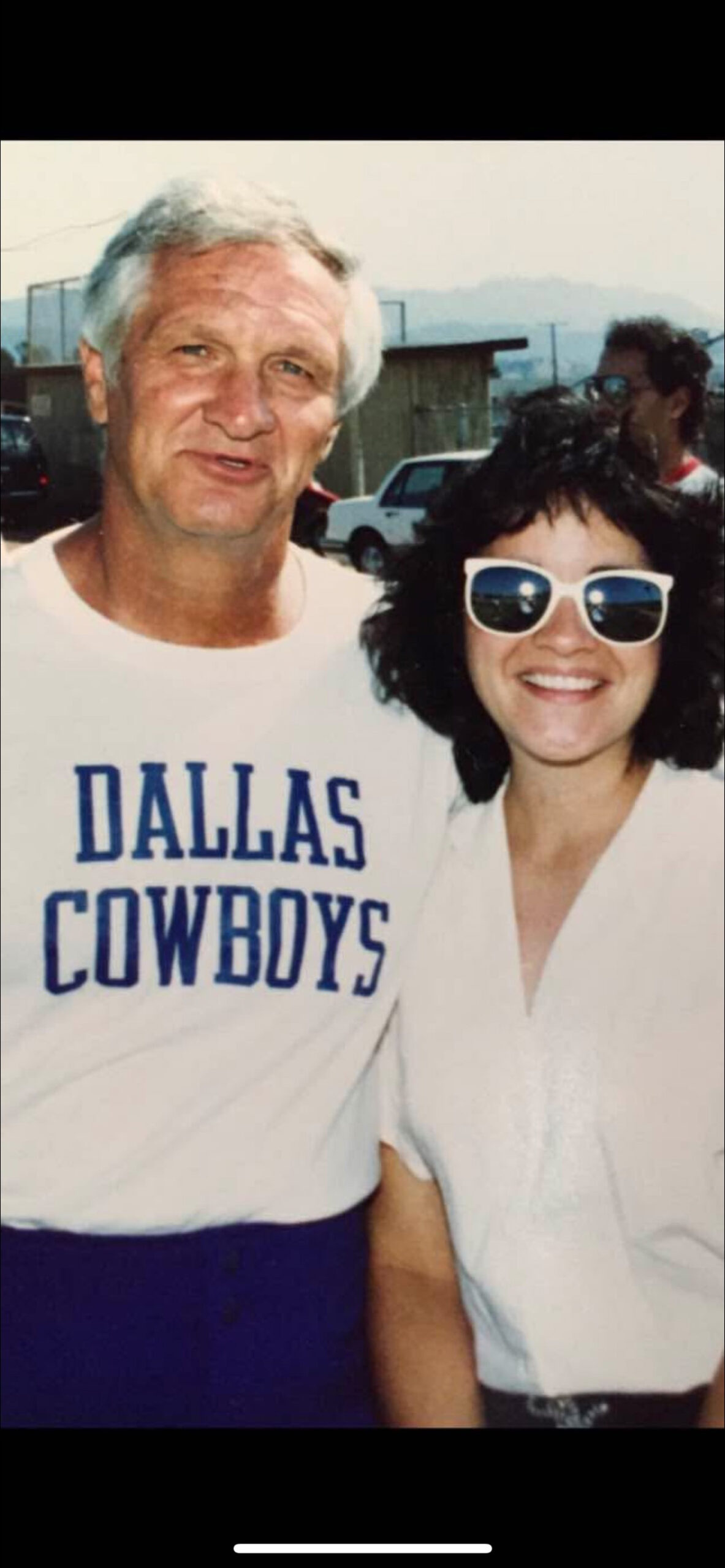 Lewis with Dallas Cowboys personnel administrator, Gilbert Brandt.
