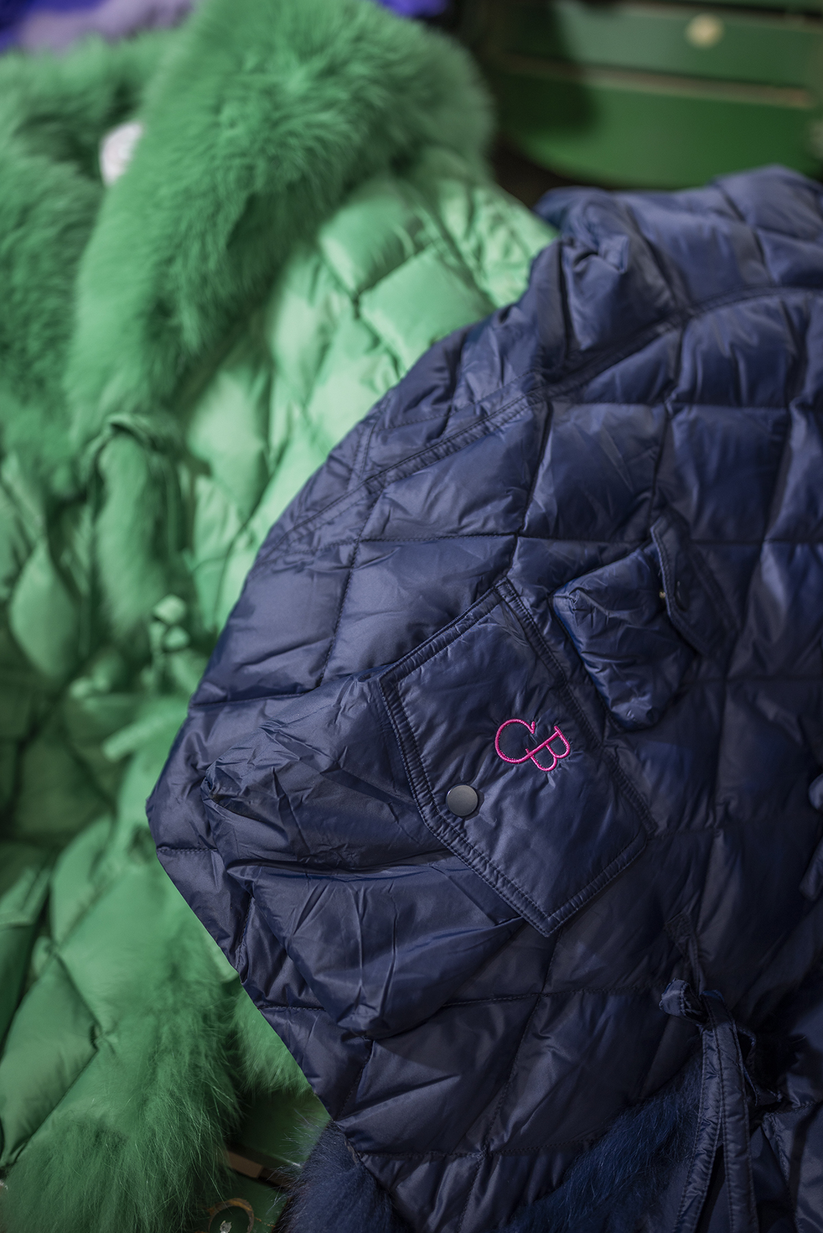 Close-up of C+B Collections coats