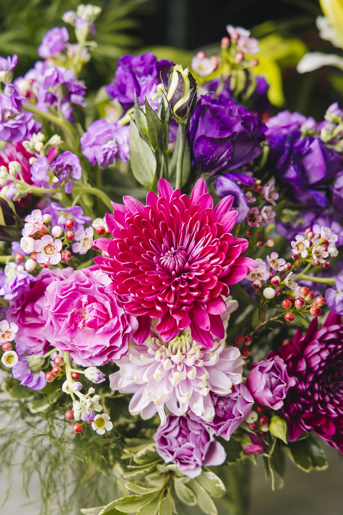 A pink and purple bouquet by Gracie Floral